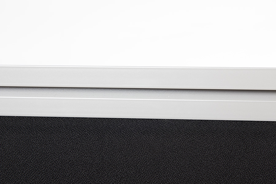 Close Up of Desk Screen Tool Rail